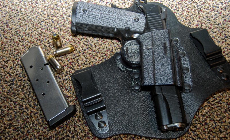 A hybrid holster like this Galco KingTuk is great for large gun carry. The wide belt attachments help stabilize and draw the gun grip towards your body.