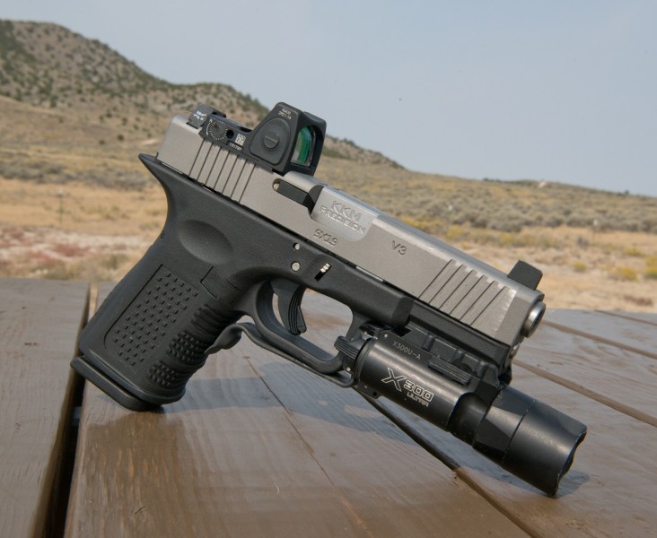 The author's customized G19-pattern pistol. It is seen here with an Adjustable LED RMR and Surefire X300.