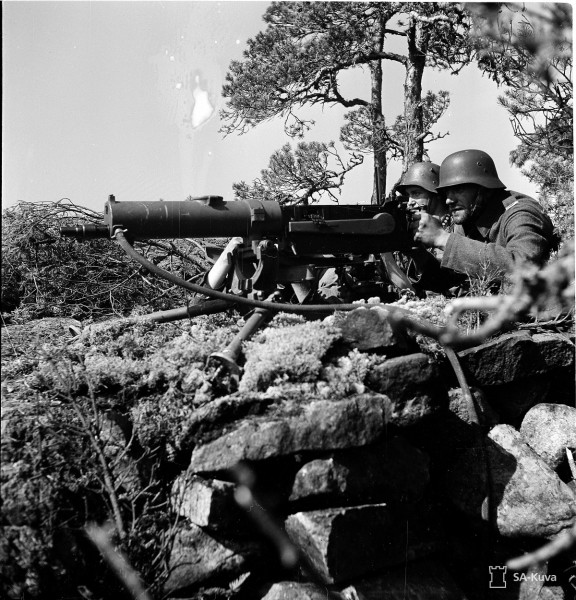 Two Finnish soldiers with a Maxim machine gun. Date taken: August 2, 1941.