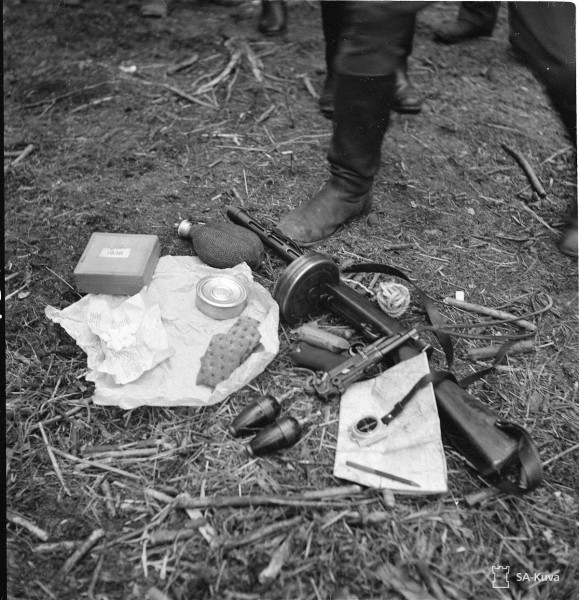 A Finnish patrol leader's kit, including a KP-31 submachine gun, grenades, and a Luger pistol. Date taken: August 2, 1941.