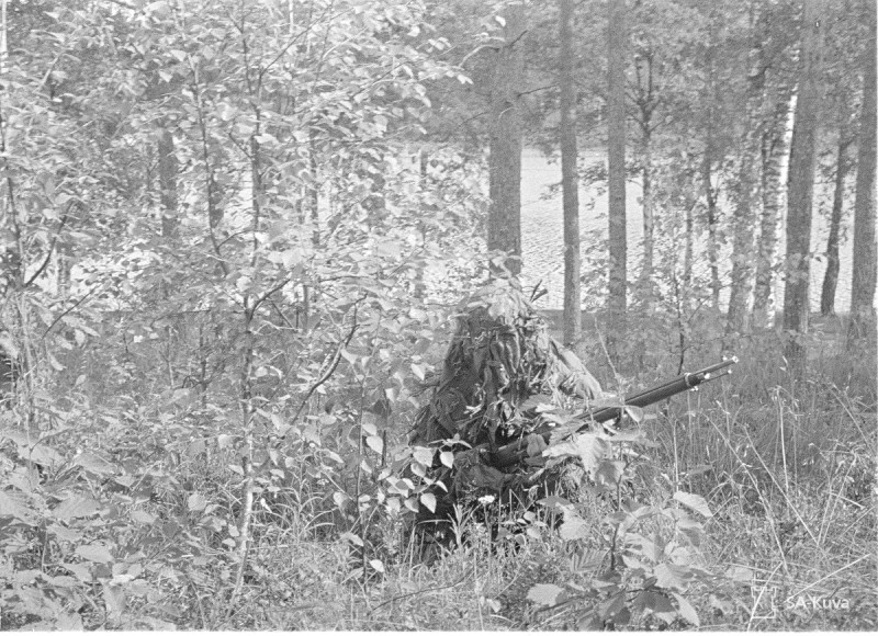A Finnish marksman with a Mosin-Nagant rifle. Date taken: August 4, 1941.