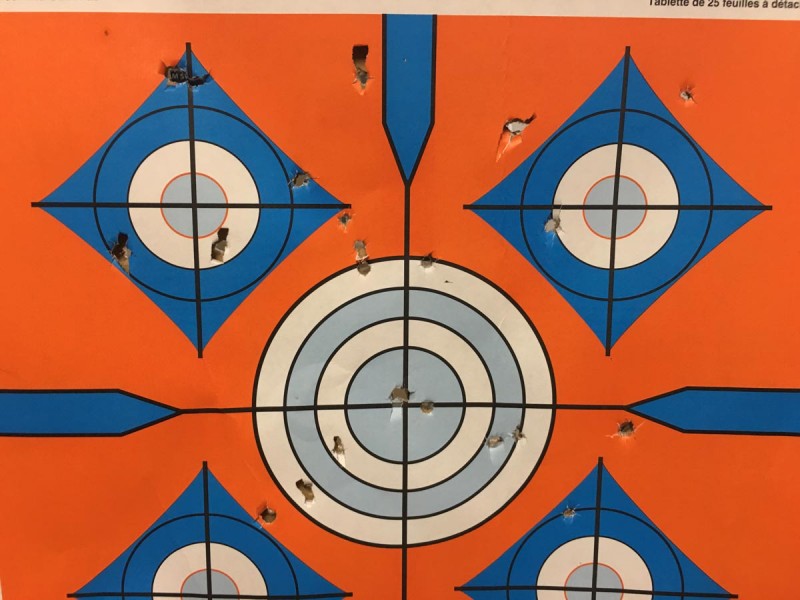 A target peppered with three buckshot Minishells at 10-yards range.