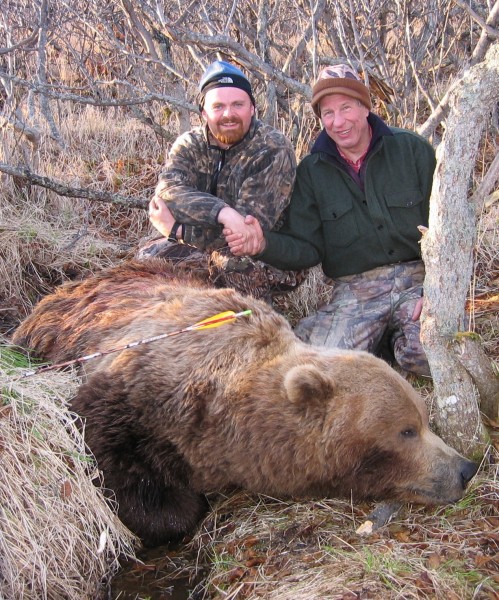 Guide Eric Umphenour (left) with the author and his record grizzly. Image courtesy of Dennis Dunn.