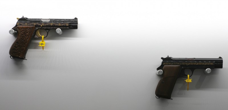 Two engraved P210s.