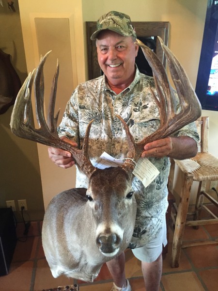Holding Superbuck for the first time is bittersweet for Jim Stinson. He’s grateful that the buck was found but sad that it was taken illegally. 