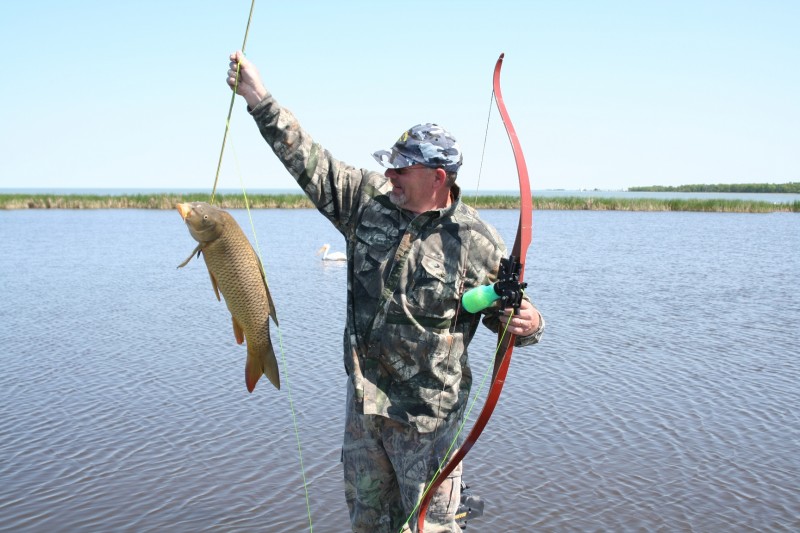 Central Manitoba is flat and covered with large, shallow lakes. It’s perfect carp habitat. Combining a bear hunt with a bowfishing adventure in this area is a no-brainer.