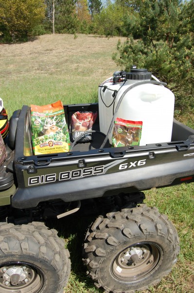 The massive cargo box is a perfect platform for running a sprayer and still have enough room for seed, minerals, or other essential land management tools, like a chainsaw.
