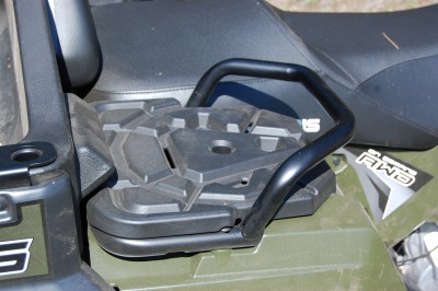 The passenger handholds double as supports for a 5-gallon bucket that can sit neatly in the grooves of the rear racks.