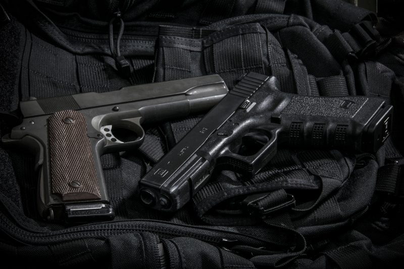 Yesterday and today: The .45 ACP 1911 sits alongside a Glock model 17 in 9mm. The Glock’s magazine holds nearly three times as much ammunition.