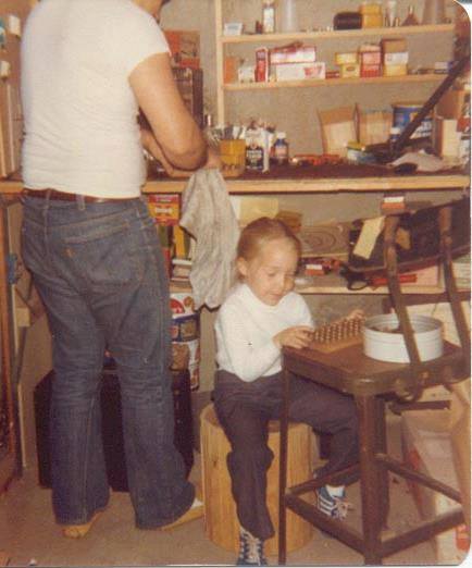 Niki loading ammo with her dad at age 3.