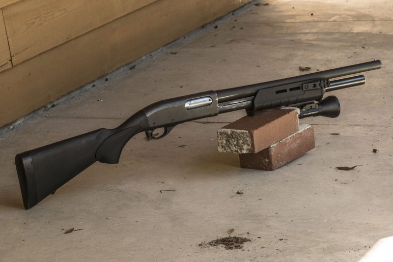 The author's Remington 870 pawn shop find with reduced length-of-pull stock, Magpul forearm, shorter barrel and Streamlight tactical light – an inexpensive but effective home-defense shotgun.