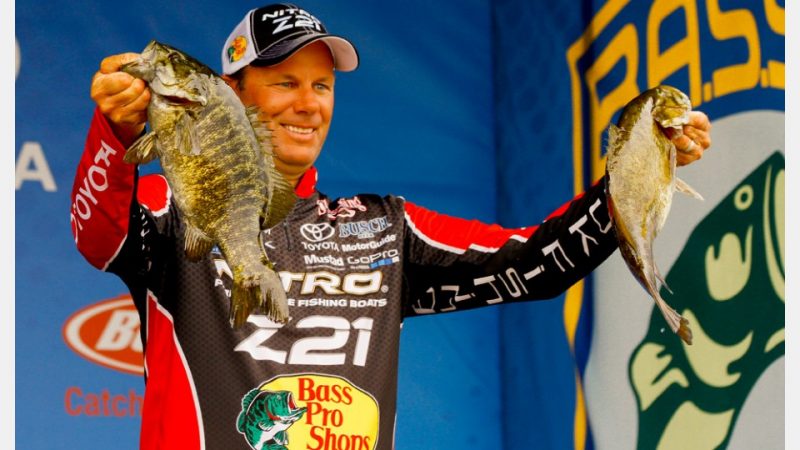 Kevin VanDam with two big smallmouth caught on the final day of the event (photo by James Overstreet/Bassmaster)
