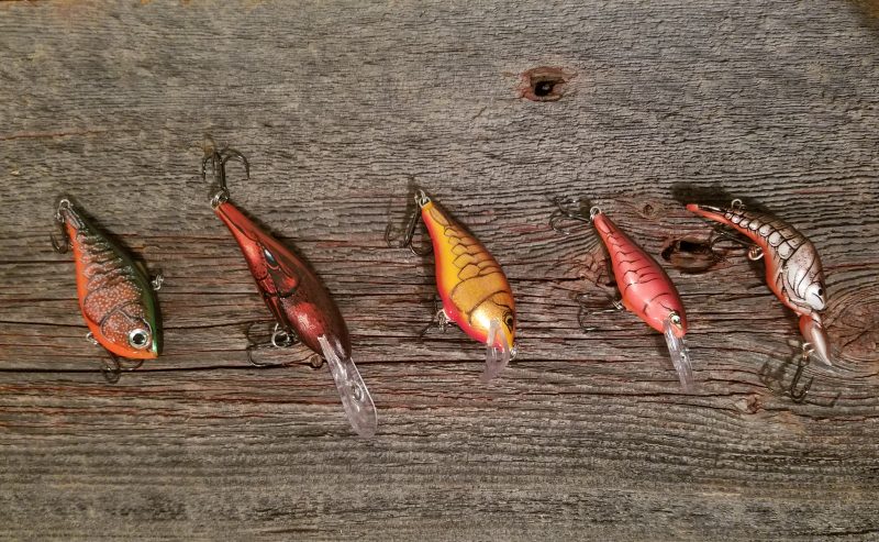 The author thinks the rusty crayfish color hues are as important, or even more important, than the lures themselves. When it comes to his favorite picks, here are five different colors in five different lures.