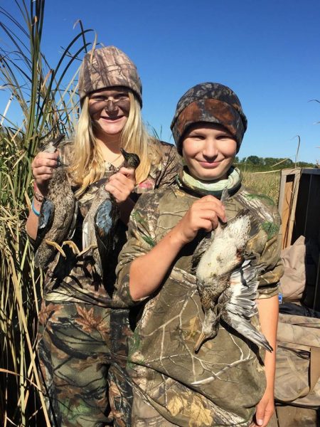 Justine and Nate with their first ducks.
