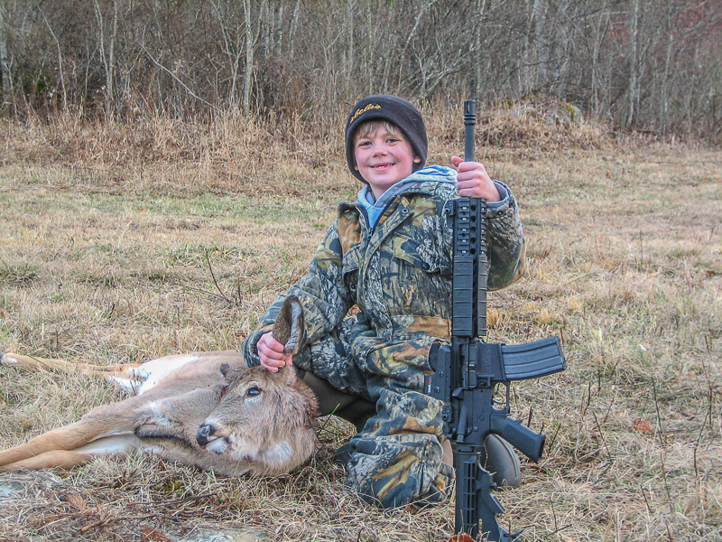 Like father, like son. ARs with adjustable stocks fit small-framed shooters very well.