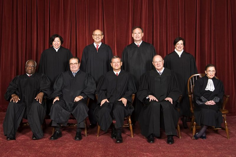 The Roberts Court, 2010. Back row (left to right): Sonia Sotomayor, Stephen Breyer, Samuel Alito, and Elena Kagan. Front row (left to right): Clarence Thomas, Antonin Scalia, Chief Justice John Roberts, Anthony Kennedy, and Ruth Bader Ginsburg. Note: There are eight justices because Antonin Scalia died on February 13, 2016 at the age of 79. The next President of the United States will nominate someone to fill the Court vacancy, then the Senate will vote (simple majority) to confirm the nominee. This nomination/confirmation system is in place so both the Executive and Legislative branches of the federal government have a voice in the composition of the Supreme Court. (Image from Wikimedia Commons)