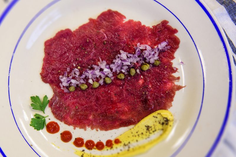 Venison Carpaccio plated and ready to devour