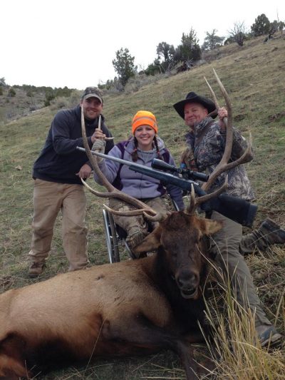 Ashlee with a bull elk she shot in 2013.