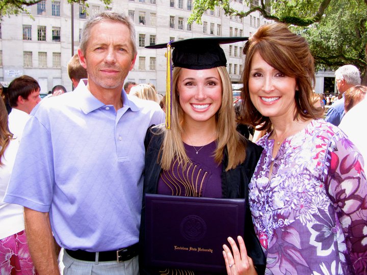 Ainsley with her proud parents.