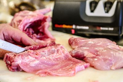 Removing loins from rabbit.