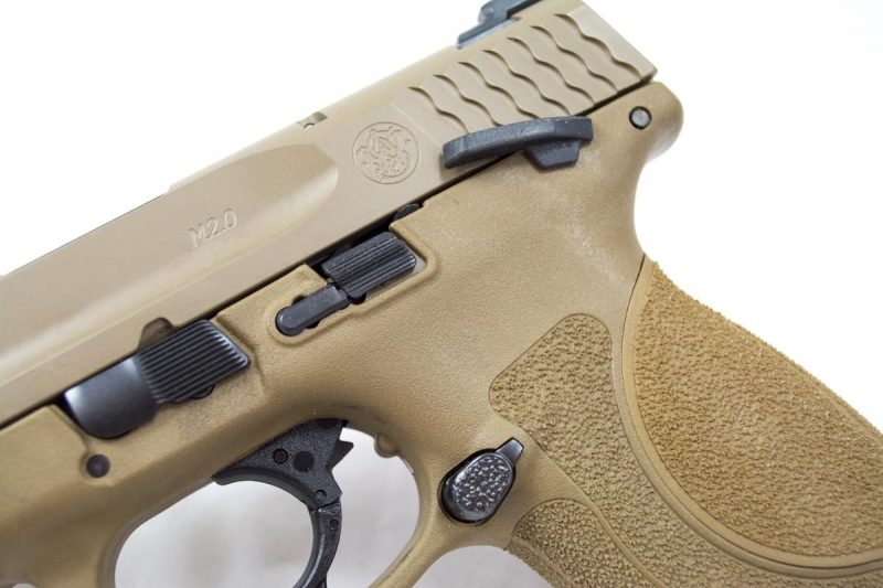 The manual safety locks the trigger, but still allows slide operation.
